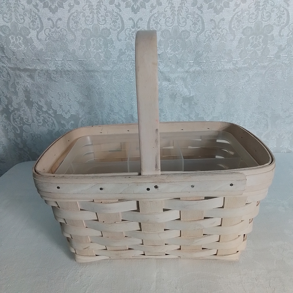 Longaberger light tan woven basket with handle and plastic insert